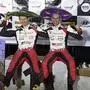French driver Sebastien Ogier (L) and his co-driver Julien Ingrassia (R) of the Toyota Yaris WRT, celebrate their win wearing sombreros on the podium of the FIA World Rally Championship in Leon, Guanajuato State, Mexico on March 14, 2020. - The organizers of the FIA, WRC in agreement with the teams and the Mexican authorities decided to end the Leon Rally today, a day earlier than scheduled, due to the coronavirus pandemic. (Photo by ALFREDO ESTRELLA / AFP)