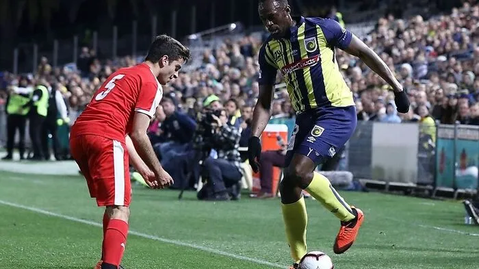 Bolt (rechts) in einem Testspiel für die Mariners