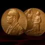 Nobel Prize Medal standing on a platform. Red and black background.