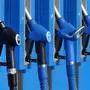 A black Diesel nozzle hangs next to others at a gas station in Frankfurt, Germany, Wednesday, Aug. 2, 2017. German auto bosses, ministers and state governors are considering how to reduce diesel emissions as drivers face the threat of possible bans on driving older diesel cars in some cities. A meeting Wednesday at the Transport Ministry is to bring together leading politicians with bosses from Volkswagen, Porsche, Audi, Mercedes, BMW, Opel and Ford. (AP Photo/Michael Probst),sujet tankstelle, tanken, zapfhahn, zapfpistole
