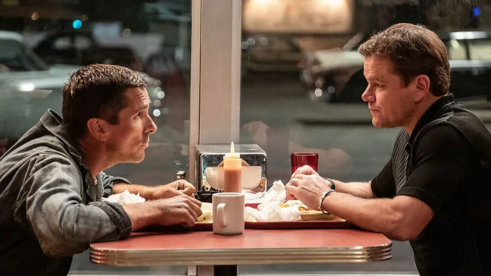 Christian Bale (Ken Miles), Matt Damon (Carroll Shelby).