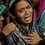 A Bangladeshi woman cries after her relative's body was recovered after Tuesday's massive landslide in Rangamati district, Bangladesh, Wednesday, June 14, 2017. Rescuers struggled on Wednesday to reach villages hit by massive landslides that have killed more than a hundred while also burying roads and cutting power in southeastern Bangladesh, officials said. (AP Photo)