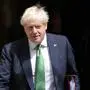 Britain's Prime Minister Boris Johnson leaves 10 Downing Street to attend the weekly Prime Ministers' Questions session in parliament in London, Wednesday, July 13, 2022. (AP Photo/Frank Augstein)
