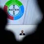 (FILES) In this file photograph taken on April 26, 2019, The CEO of German chemicals giant Bayer, Werner Baumann, gives a speech during the group's annual general meeting at the World Conference centre in Bonn, western Germany. - The German chemical group Bayer, owner since 2018 of Monsanto, told AFP on May 10, 2019, that he had "no knowledge" of personalities files ordered by his subsidiary and listing their position on pesticides. France 2 revealed late May 9, in an investigation that the US group Monsanto have secretly  identified "hundreds of personalities" in France: journalists, politicians and scientists, depending on their position on pesticides, including glyphosate, sometimes using private information. (Photo by INA FASSBENDER / AFP)