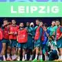 Portugal's players including Portugal's forward #07 Cristiano Ronaldo (C) arrive for the MD-1 training session at the Leipzig Stadium in Leipzig, eastern Germany on June 17, 2024, on the eve of their UEFA Euro 2024 Group F football match against the Czech Republic. (Photo by JOHN MACDOUGALL / AFP)