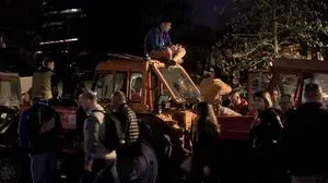 15.03.2025 BelgradeSerbia Politics/ Life/ Rebellion- protest people against the government and corruption Supporter of university students climb at tractor set-up as a fence of a pro-government supporters camp.