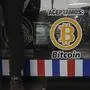 "We accept Bitcoin" is announced at a barber shop in Santa Tecla, El Salvador, Saturday, Sept. 4, 2021. Starting Tuesday, Sept. 7, all businesses will have to accept payments in Bitcoin, except those lacking the technology to do so. (AP Photo/Salvador Melendez)
