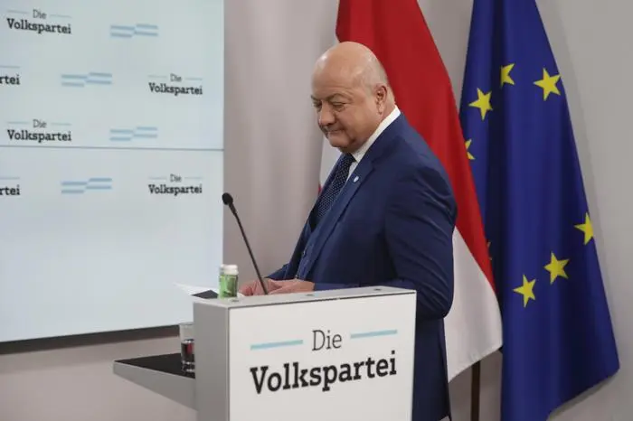 Austrian Peoples' Party (OeVP) secretary general Christian Stocker addresses a news conference, in Vienna, Austria, Sunday, Jan. 5, 2025, as the party nominated him as interim leader after the expected resignation of Chancellor Karl Nehammer. (AP Photo/Heinz-Peter Bader)