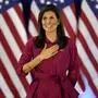Republican presidential candidate former UN Ambassador Nikki Haley gestures to the audience as she concludes a speech at a caucus night party at the Marriott Hotel in West Des Moines, Iowa, Monday, Jan. 15, 2024. (AP Photo/Abbie Parr)