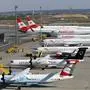 Am Boden: Flieger der  Lufthansa-Tochter AUA und der Ryanair-Tochter Laudamotion 