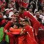 Turkey's players celebrate their team's third goal during the UEFA Euro 2024 Group F football match between Turkey and Georgia at the BVB Stadion in Dortmund on June 18, 2024. (Photo by INA FASSBENDER / AFP)