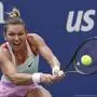 FILE - Simona Halep, of Romania, returns a shot to Daria Snigur, of Ukraine, during the first round of the U.S. Open tennis championships, on Aug. 29, 2022, in New York. Former top-ranked tennis player Simona Halep will go to sport’s highest court Wednesday, Feb. 7, 2024 to challenge her four-year ban in a doping case. The Court of Arbitration for Sport in Lausanne, Switzerland says Halep plans to attend in person when the appeal opens for a closed-doors hearing. (AP Photo/Seth Wenig, File)