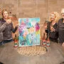 Alexander und Petra Egger sowie Barbara Schmidlin und Edmund Kolb mit dem neuen Etikett