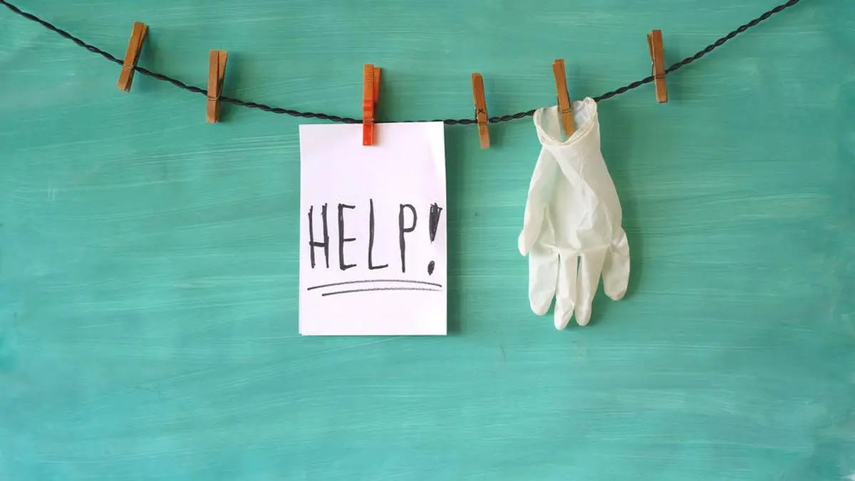 corona virus,shortage of medical equipment,medical glove and message help, symbol, metaphore,concept