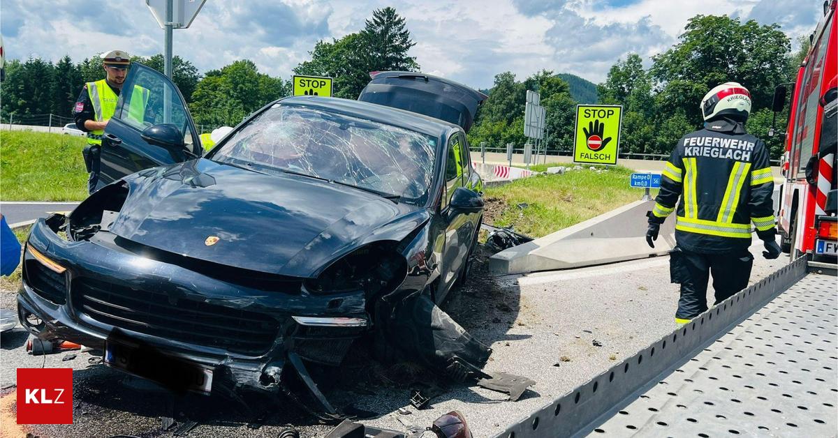 Porsche crashed into concrete wall and was hurled through the air