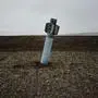 -- AFP PICTURES OF THE YEAR 2015 --
A picture taken on April 7, 2015, shows an unexploded rocket in field near the village of Dmitrivka. As a tenuous ceasefire brings a lull to Ukraine's yearlong conflict between pro-Russian rebels and Ukrainian troops, the lurking danger of landmines threatens lives as well as economic recovery, particularly on once rich agricultural lands.  AFP PHOTO / DIMITAR DILKOFF / AFP / DIMITAR DILKOFF
