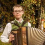 Simon Gspurning gewann den ersten Preis, eine steirische Harmonika der "Harmonikaerzeugung Schmidt"