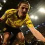 Dortmund's Austrian midfielder #20 Marcel Sabitzer celebrates scoring his team's third goal 4:2 during the UEFA Champions League quarter-final second leg football match between Borussia Dortmund and Atletico Madrid in Dortmund, western Germany on April 16, 2024. (Photo by INA FASSBENDER / AFP)