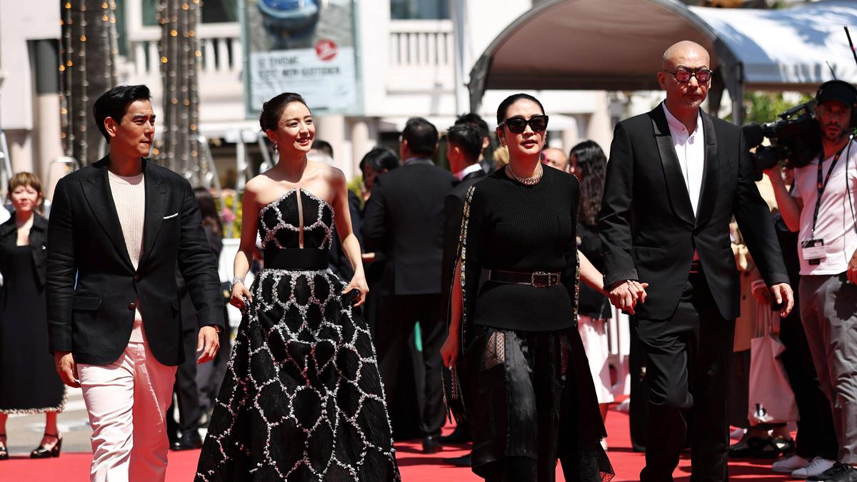 Regisseur Guan Hu (rechts) bekam für Black Dog einen Preis in Cannes
