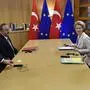 Turkish President Recep Tayyip Erdogan, second left, meets with European Council President Charles Michel, right, and European Commission President Ursula von der Leyen, second right, at the European Council building in Brussels, Monday, March 9, 2020. Turkish President Recep Tayyip Erdogan visits Brussels on Monday for talks with EU and NATO officials amid a standoff between Ankara and Brussels over sharing of responsibility for refugees and migrants. (John Thys, Pool Photo via AP)