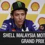 Valentino Rossi, Marc Marquez | MotoGP rider Valentino Rossi of Italy, left, speaks while Marc Marquez of Spain looks on during a press conference ahead of Sunday's Malaysian Motorcycle Grand Prix in Sepang, Malaysia, Thursday, Oct. 22, 2015. (AP Photo/Joshua Paul)