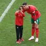 A pitch invader takes his selfie with Portugal's forward #07 Cristiano Ronaldo during the UEFA Euro 2024 Group F football match between Turkey and Portugal at the BVB Stadion in Dortmund on June 22, 2024. (Photo by KENZO TRIBOUILLARD / AFP)