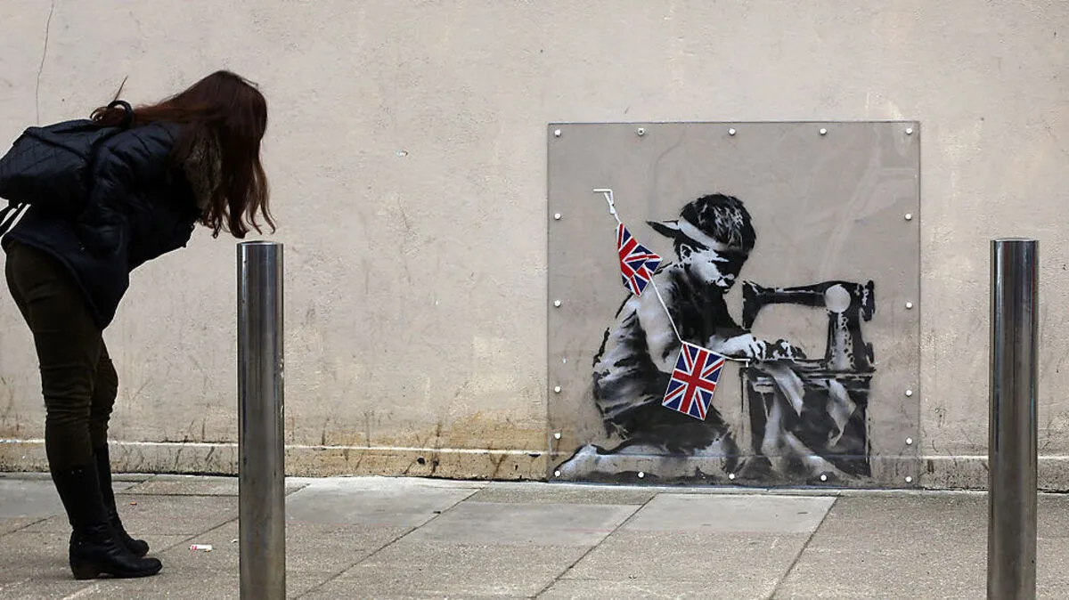Banksy hat "Slave Labour" an der Mauer eines Diskonters im Norden Londons angebracht