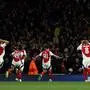 Arsenal's English midfielder #41 Declan Rice celebrates scoring the team's second goal during the UEFA Champions League Quarter final first leg football match between Arsenal and Real Madrid, at the Emirates Stadium, in London, on April 8, 2025. (Photo by Adrian Dennis / AFP)
