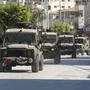 241027 -- TULKARM, Oct. 27, 2024 -- Vehicles of Israeli forces are seen during a military operation in the Salam neighborhood in the West Bank city of Tulkarm, on Oct. 26, 2024. Photo by /Xinhua MIDEAST-TULKARM-ISRAEL-RAID NidalxEshtayeh PUBLICATIONxNOTxINxCHN