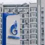 (FILES) A view shows a petrol station of the Russian oil producer Gazprom Neft in front of an apartment block in Moscow on September 4, 2023. The Russian economy has proven more resilient than expected and will continue to grow this year despite heavy Western sanctions, while the war in Gaza will weigh on countries in the region, European Bank for Reconstruction and Development (EBRD) forecast on May 15, 2024. (Photo by NATALIA KOLESNIKOVA / AFP)
