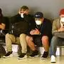 Passengers wait to check-in at the departures hall at the international airport in Sydney on March 18, 2020. - Australia urged its citizens on March 18, not to travel abroad and warned those already overseas to rush home as it imposed unprecedented steps to choke off the spread of the coronavirus epidemic taking off Down Under. (Photo by PETER PARKS / AFP)