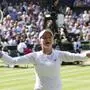 Barbora Krejcikova of the Czech Republic celebrates after defeating Jasmine Paolini of Italy in the women's singles final at the Wimbledon tennis championships in London, Saturday, July 13, 2024. (AP Photo/Kirsty Wigglesworth)
