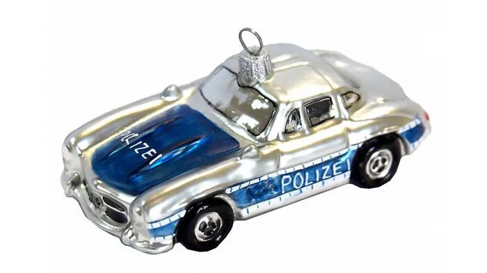 Ein Mercedes 300 SL "Flügeltürer" als Polizeiauto. Um 12,99 Euro bei www.zauberdeko.de