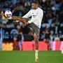 Real Madrid's French forward #09 Kylian Mbappe warms up before the Spanish league football match between RC Celta de Vigo and Real Madrid CF at the Balaidos stadium in Vigo on October 19, 2024. (Photo by MIGUEL RIOPA / AFP)