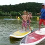 Günther Mossier und die jungen Stehpaddler am Sulmsee