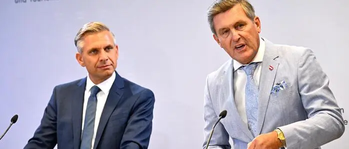 Wirtschaftsminister Wolfgang Hattmannsdorfer (ÖVP) und Infrastrukturminister Peter Hanke (SPÖ)