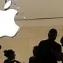 In this May 31, 2018, photo, customers enter the Apple store in New York. Apple serves up fiscal third-quarter results Tuesday, July 31. The iPhone maker is expected to extend its string of solid earnings and revenue growth with its latest quarterly report card. (AP Photo/Mark Lennihan)
