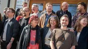 Elke Kahr mit anderen KPÖ-Funktionären bei der Grazer KPÖ-Bezirkskonferenz