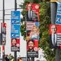 Election campaign placards for the Social Democratic Party (SPD), and the far-right Alternative for Germany (AfD) party hang on lamp posts in Frankfurt (Oder), eastern Germany, on September 16, 2024, ahead of state elections in Brandenburg which take place on September 22, 2024. (Photo by John MACDOUGALL / AFP)