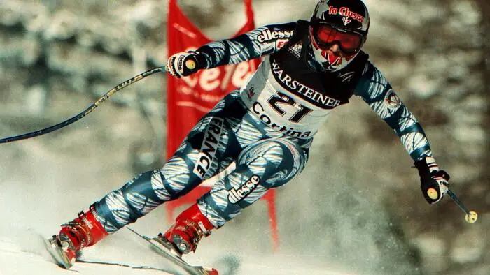 France's Regine Cavagnoud speeds down the track on her way to winning the World Cup women's downhill in Cortina D'Ampezzo Thursday, January 21, 1999. (AP Photo/Armando Trovati)