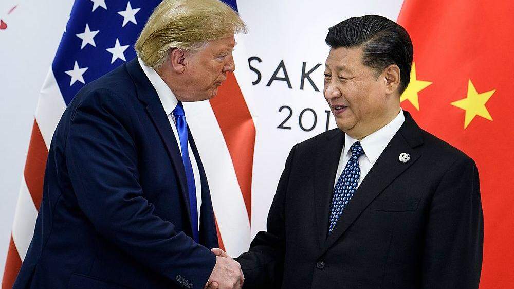 Shakehand zwischen Trump und Xi Jinping