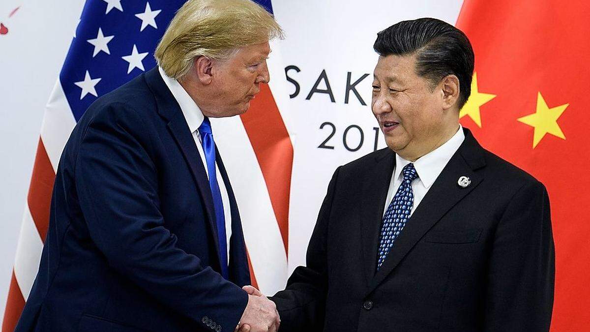 Shakehand zwischen Trump und Xi Jinping