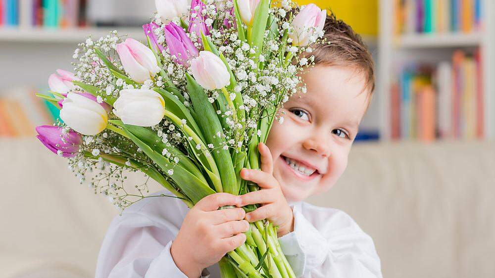 Blumen und ein strahlendes Lächeln - was gibt es Schöneres?