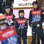 Austria's Jan Hoerl celebrates bronze with his teammates after during the Mixed Team Large Hill HS138 event at the FIS Ski Jumping World Championship in Trondheim, Norway on March 5, 2025. Norway won gold ahead of silver medallists Slovenia and bronze medallists Austria. (Photo by Jonathan NACKSTRAND / AFP)
