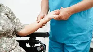 Doctor holding hands Asian elderly woman patient, help and care in hospital. Copyright: x RECORD DATE NOT STATED