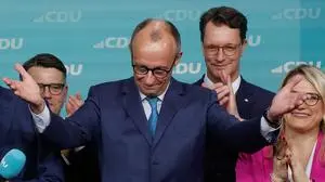 TOPSHOT - Friedrich Merz, leader of Germany's conservative Christian Democratic Union (CDU) and his party's main candidate for Chancellor addresses supporters after the first exit polls in the German general elections were announced on TV during the electoral evening in Berlin on February 23, 2025. (Photo by Odd ANDERSEN / AFP)