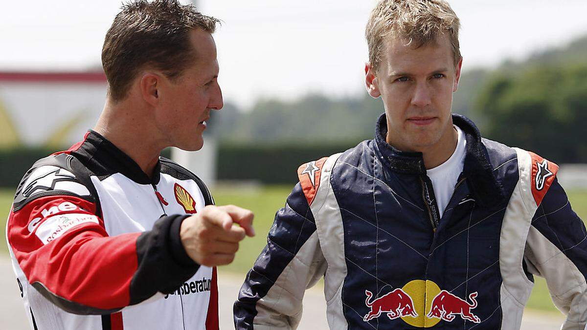 Tauschten sich regelmäßig aus: Michael Schumacher und Sebastian Vettel, hier im Jahr 2009