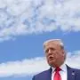 US President Donald Trump speaks to the press before boarding Air Force One as he departs from Joint Base Andrews in Maryland on May 30, 2020. - Trump travels to Kennedy Space Center in Florida to watch the launch of the manned SpaceX Demo-2 mission to the International Space Station. (Photo by MANDEL NGAN / AFP)