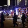 Police and ambulances work next to the Christmas market, where a car crashed into a crowd injuring between "60 and 80 people", according to a spokesman for the local rescue service, on December 20, 2024 in Magdeburg, eastern Germany. According to the emergency service, several people were "severely" injured", the spokesman said. The death toll in Magdeburg market attack rose to two according to the State Premier. (Photo by Ronny HARTMANN / AFP)