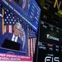 FILE - A screen displays a news conference with Federal Reserve Chairman Jerome Powell on the floor at the New York Stock Exchange in New York, May 1, 2024. (AP Photo/Seth Wenig, File)
